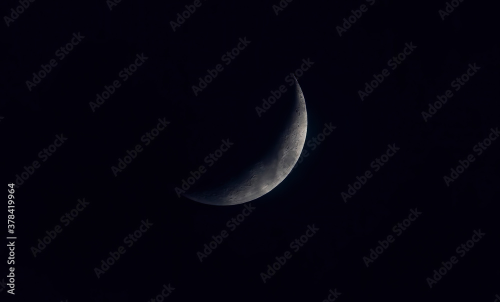 Sickle shaped moon on the night sky Sickle shaped moon on the night sky