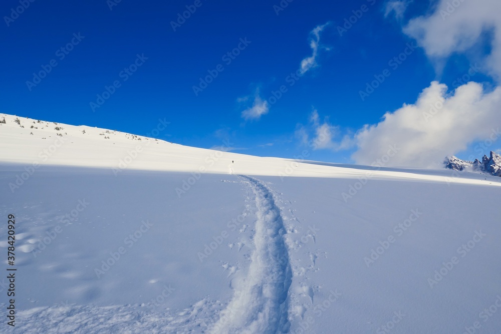 footpath in the snow to the top of the mountain footpath in the snow to the top of the mountain