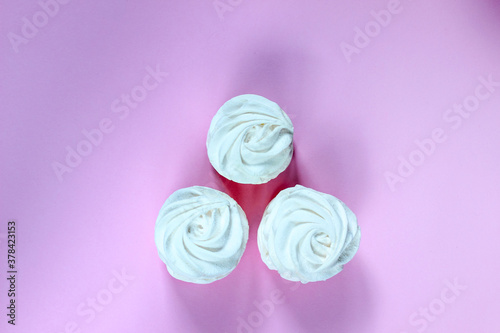 Wallpaper Mural Top view on homemade white marshmallow pastille on light pink background Torontodigital.ca
