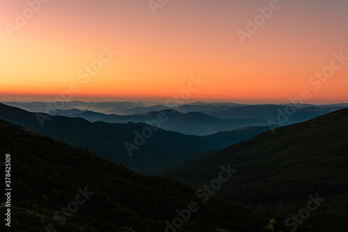 Picturesque landscapes of the Carpathians  before sunrise there is a light fog  sunrise in Montenegro.