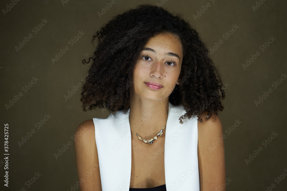 Brunette girl with long and shiny curly hair. Brunette girl with long and shiny curly hair.