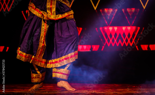 indian classical dance form in feet with musical anklet with selective focus and blur photo