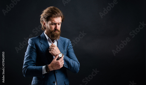 handsome man wear office suit. male beauty and fashion. brutal businessman with perfect beard and moustache. real boss in vest. mature bearded man. confidence and charisma. copy space