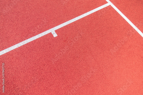 Sport background. White lines on outdoor basketball field. Top view © vejaa