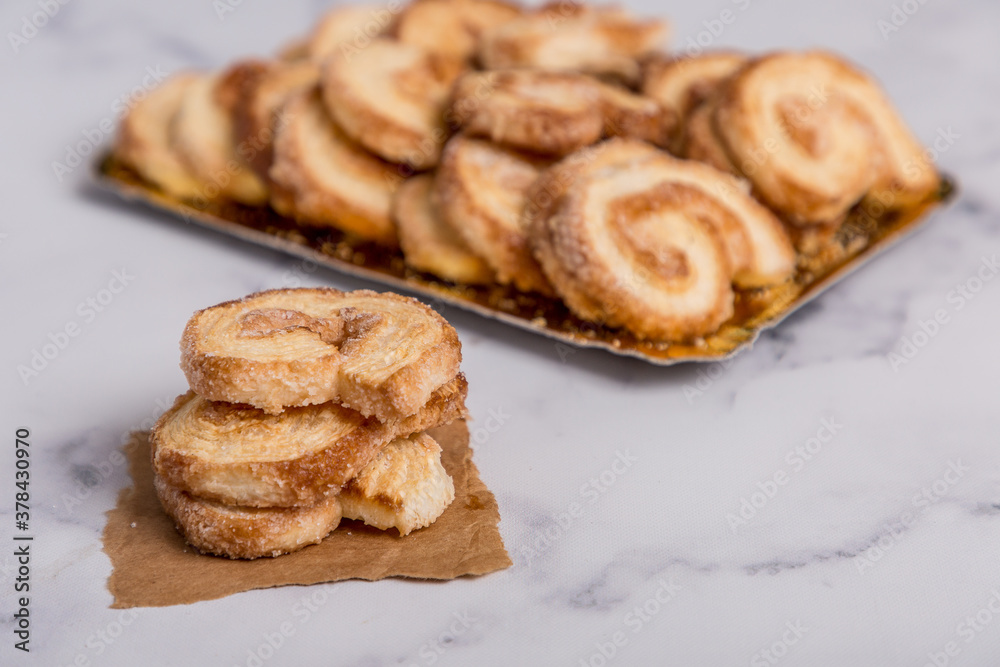 Palmiers cookies on white marble Palmiers cookies on white marble
