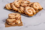 Palmiers cookies on white marble