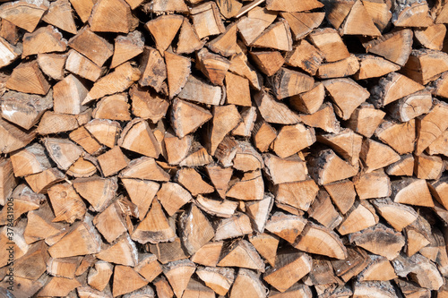 stacked and chopped wood form a background