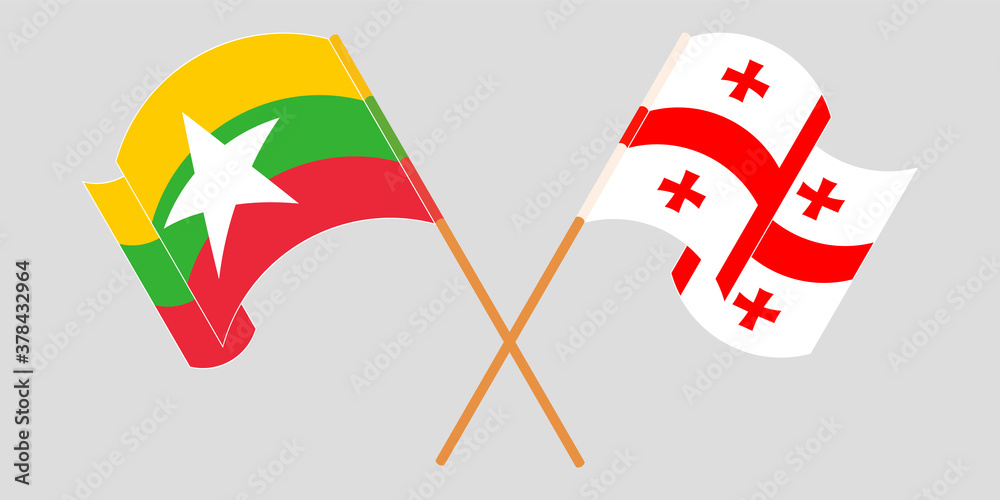 Crossed and waving flags of Myanmar and Georgia Crossed and waving flags of Myanmar and Georgia