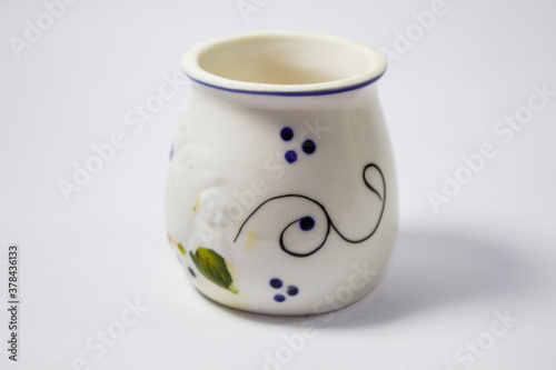 Small ceramic container with drawn details