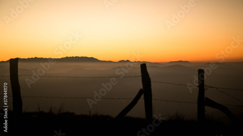 Atardecer con niebla sobre los Valles Pasiegos, en San Roque de Riomiera photo