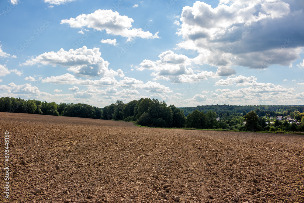 Plowed agricultural field in the countryside
Plowed agricultural field in the countryside