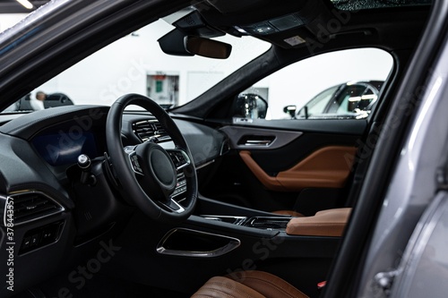 Modern car interior with leather seats.