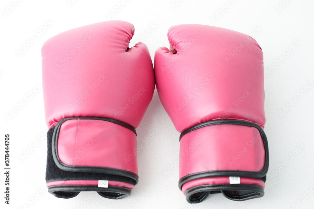 Red boxing gloves are depicted on a white background Red boxing gloves are depicted on a white background