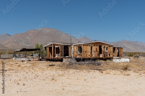 Abandoned house camper trailer in the middle of the desert in California s Mojave desert  near Ridgecrest. 