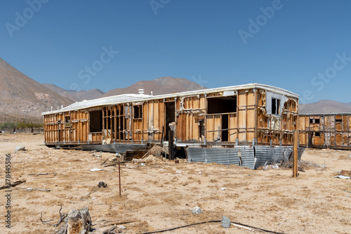 Abandoned house camper trailer in the middle of the desert in California's Mojave desert, near Ridgecrest.  © Unwind