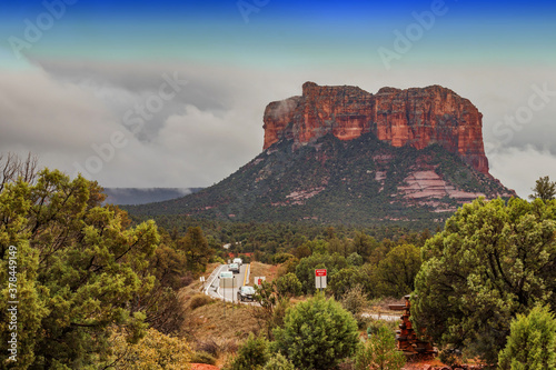 Winding highway at the foot of the giant red mountain near Sedona, AZ, USA