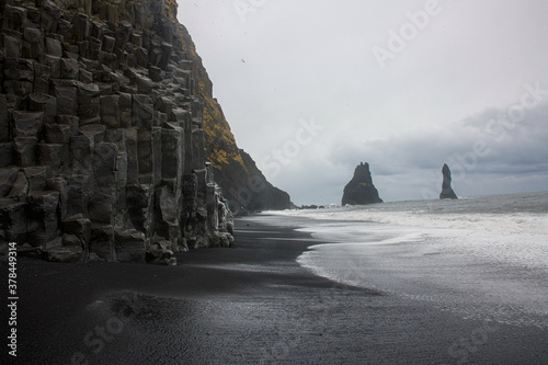 Reynisfjara black sand beach with basalt columns in southern Iceland