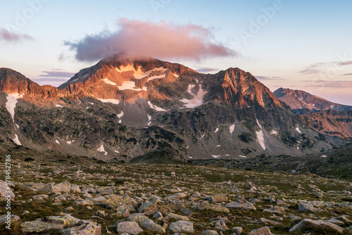 Sunset landscape with Kamenitsa peak and Tevno lake. photo