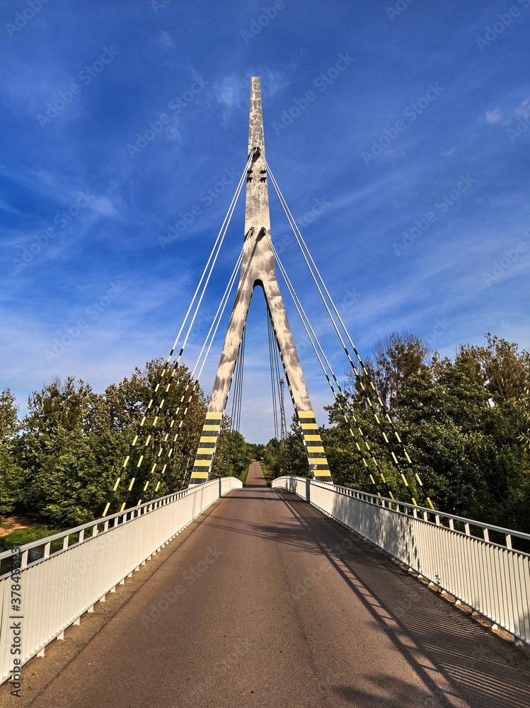 Suspension bridge over Wkra river in Śniadówko, Poland
