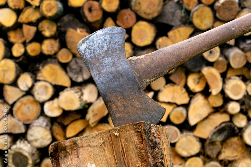 cutting a stack of firewood