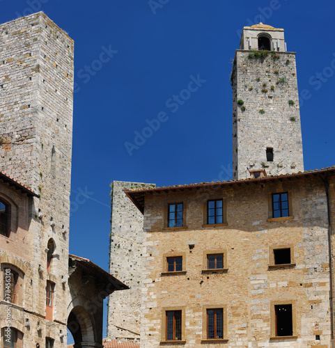 Tower of Pesciolini from the Piazza della Cisterna in San Gimignano photo