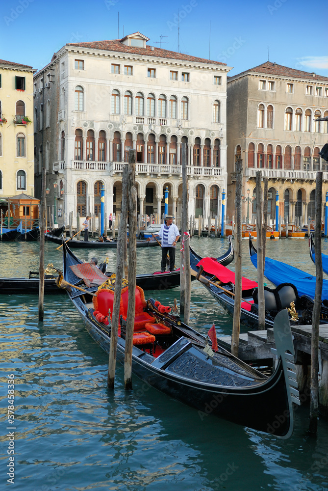 Gondolas and Gondoliers on the Grand Canal in Venice