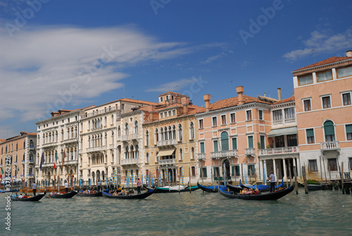 Row of gondoliers plying the Grand Canal in Venice