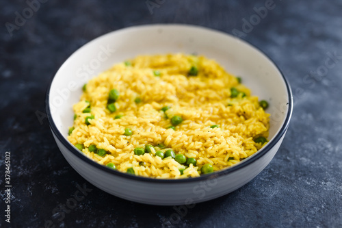 plant-based food, vegan turmeric ginger risotto with peas