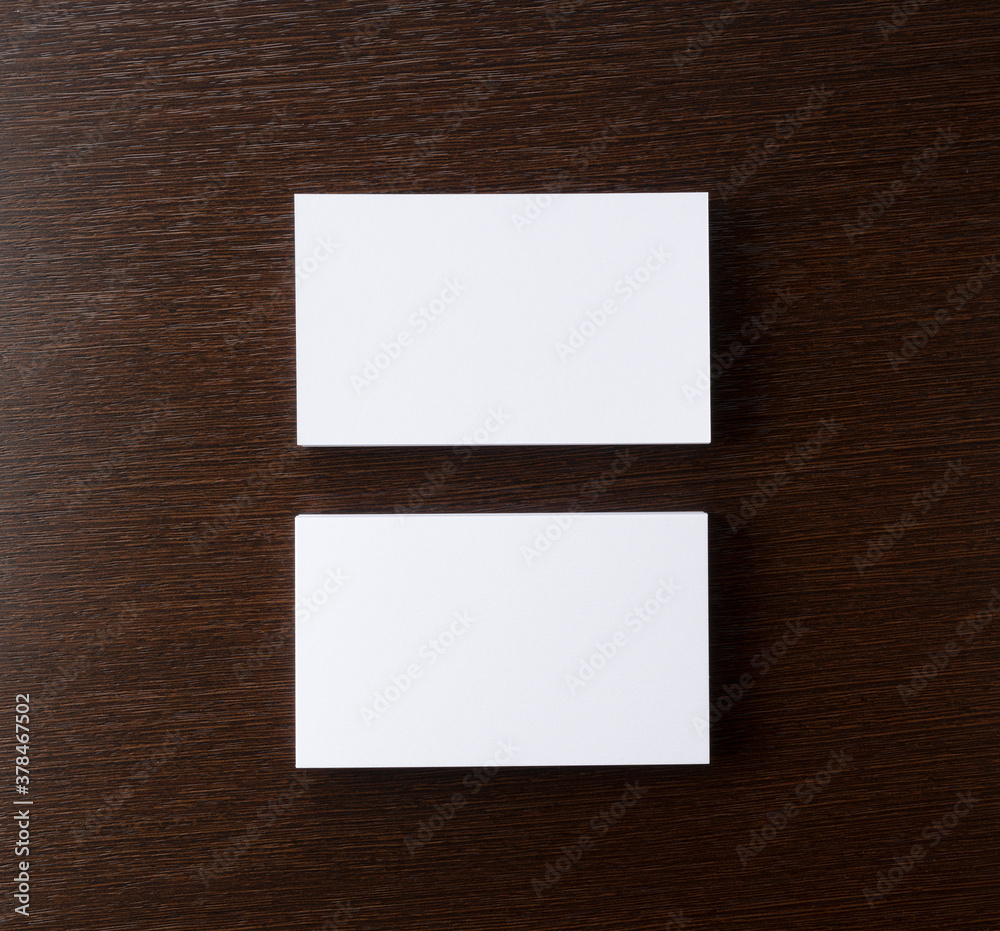 Business cards on a wooden background