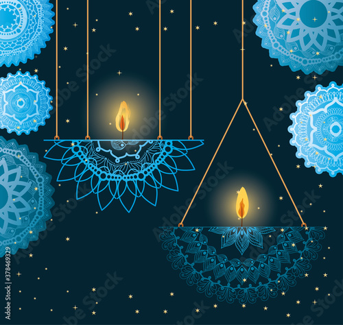 Happy diwali hanging candles with blue mandalas vector design