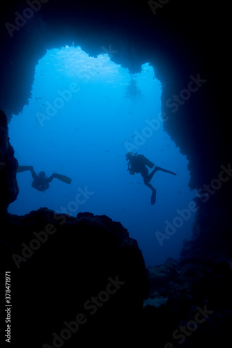 Scuba Divers in Cave, Galapagos Islands, Ecuador