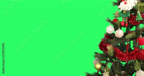 Decorated Christmas tree on green screen chroma key background