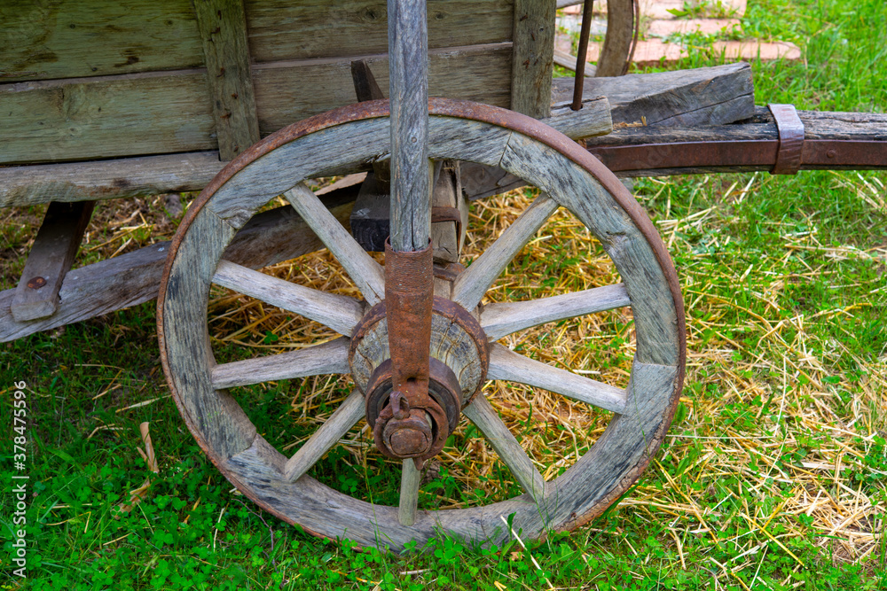 wooden cart with wheels with wooden spokes wooden cart with wheels with wooden spokes