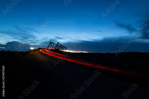 Car Trails  at Dainthlen Waterfall during sunset near Cherrapunji ,Meghalaya, India photo