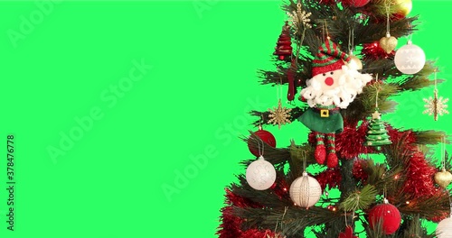 Decorated Christmas tree on green screen chroma key background
