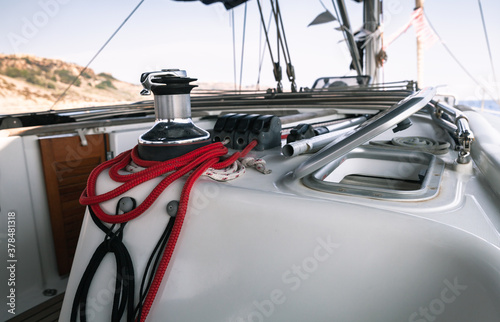 Sailboat winch with red rope