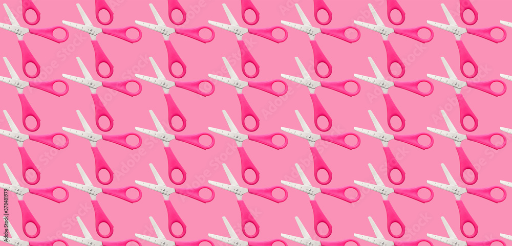 Many scissors for paper on color background