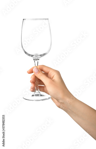 Hand with empty glass on white background