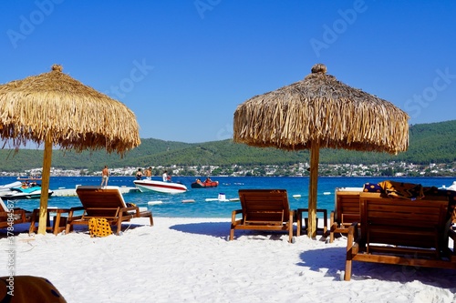 Bodrum, Turkey - August 2020: Hotel beach Lujo. Beautiful tropical beach banner. White sand travel tourism wide panorama background concept. Amazing beach landscape, yachts, Luxury tourism