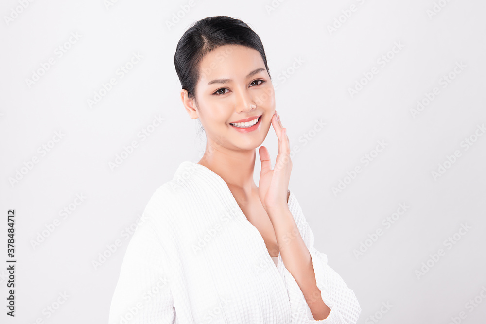 Beautiful young asian woman with clean fresh skin on white background, Face care, Facial treatment, Cosmetology, beauty and spa, Asian women portrait Beautiful young asian woman with clean fresh skin on white background, Face care, Facial treatment, Cosmetology, beauty and spa, Asian women portrait