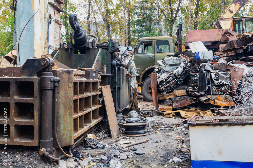 Scrap yard, metal for recycling, press for non-ferrous metal.