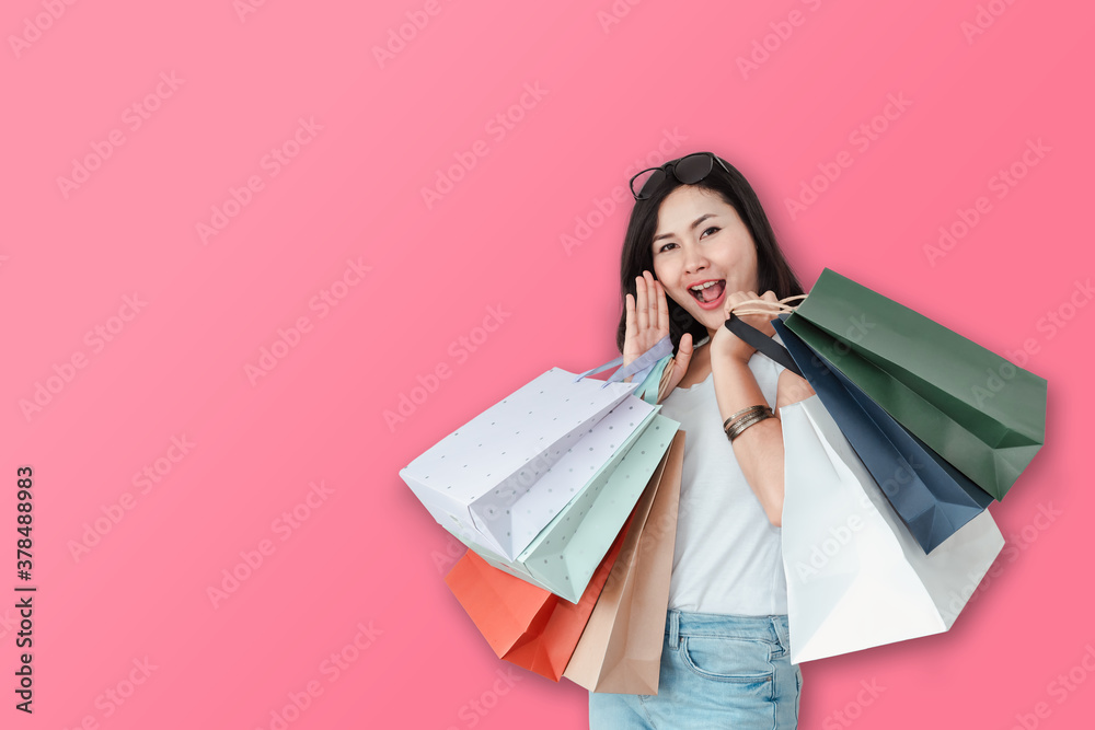 Shopping Holiday and Customer Sale Concept, Portrait of Shopaholic Woman With Holding Bags on Pink Background. Attractive Beautiful Happy Woman Posing With Shopping Bag on Copy Space Pink Backgrounds. Shopping Holiday and Customer Sale Concept, Portrait of Shopaholic Woman With Holding Bags on Pink Background. Attractive Beautiful Happy Woman Posing With Shopping Bag on Copy Space Pink Backgrounds.