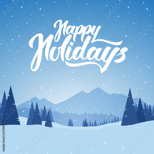 Blue mountains winter snowy landscape with pines and hand lettering of Happy Holidays. Merry Christmas.