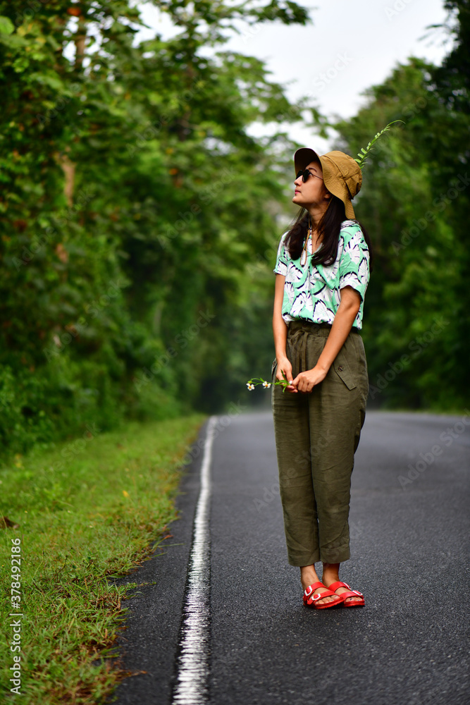A lonely girl on the road. A lonely girl on the road.
