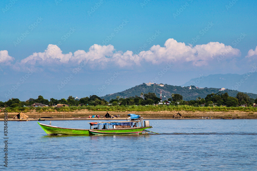 Fototapeta premium Boat trip on the Irrawaddy river in Mandalay, Myanmar former Burma