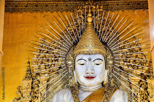 Large White Marble Buddha Statue in Kyauktawgyi Paya, Mandalay, Myanmar Burma photo