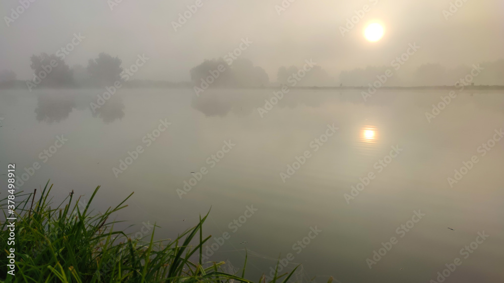 Fishing lake in the foggy morning Fishing lake in the foggy morning