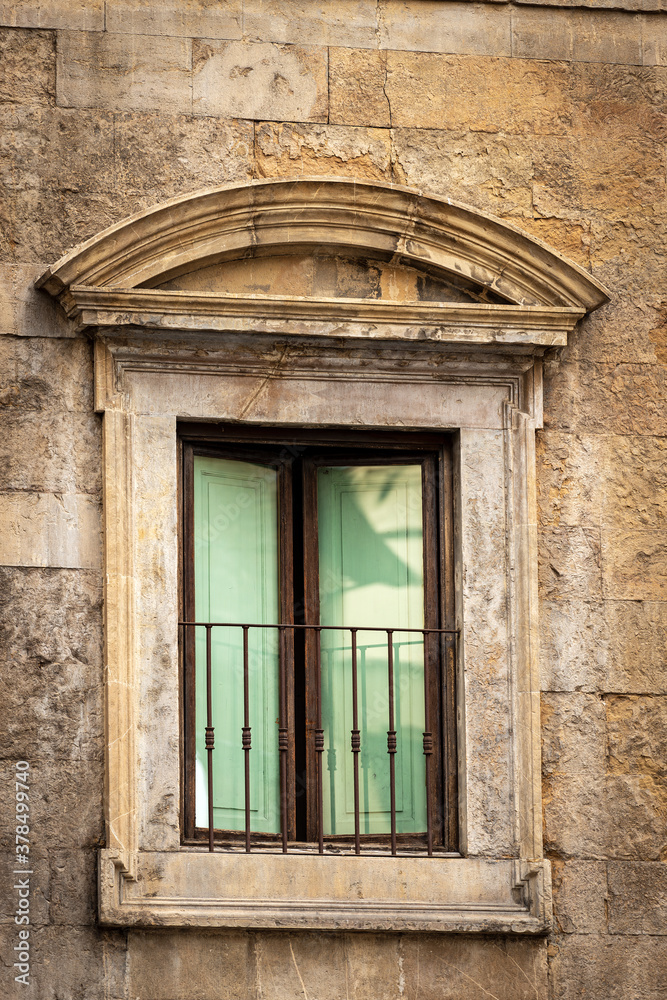 Florence, close-up of a window of the Bartolini Salimbeni Palace (1520-1523) in Renaissance style, UNESCO world heritage site, Piazza Santa Trinita, Tuscany, Italy, Europe. Florence, close-up of a window of the Bartolini Salimbeni Palace (1520-1523) in Renaissance style, UNESCO world heritage site, Piazza Santa Trinita, Tuscany, Italy, Europe.