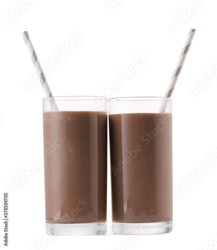 Glass cup of chocolate milk with a straw isolated on white