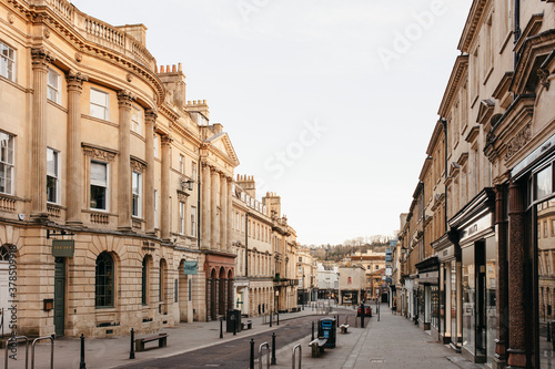 Buildings along empty street, Bath, Somerset, UK
 photo